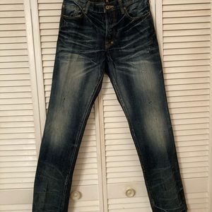 Slightly Arnie wash blue jeans